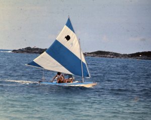 1964: Me holding the tiller during a regatta at the base beach, Clearwater, held for the kids who took a summer sailing class through the Youth Center.